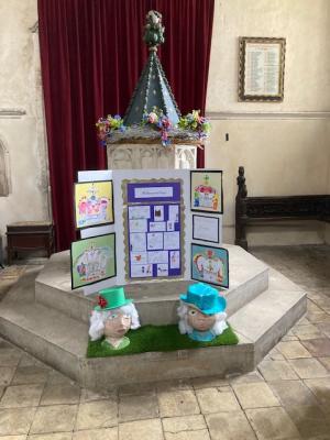 Pictures and two papier mache models of the Queen
